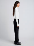 Proenza Schouler side image of model wearing Teddy Pant in Wool Twill Suiting with Organza in black