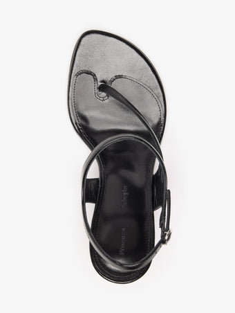 Proenza Schouler Still Life Aerial Image of Tee 85 Thong Sandal In Slick Nappa in Black
