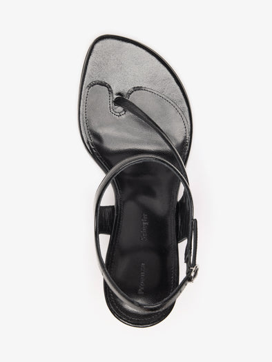 Proenza Schouler Still Life Aerial Image of Tee 85 Thong Sandal In Slick Nappa in Black