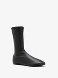 Proenza Schouler Front 3/4 image of Tee Sock Boots in Faux Leather in black