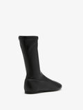 Proenza Schouler Back 3/4 image of Tee Sock Boots in Faux Leather in black