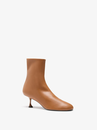Proenza Schouler front 3/4 image of Tee Stretch Booties in Tobacco