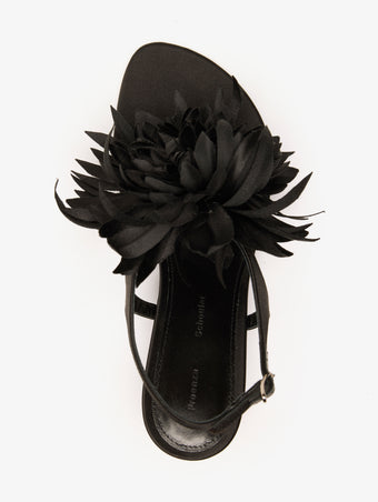 Proenza Schouler Still Life Aerial Image of Tee Thong Flower Sandals in Satin in Black