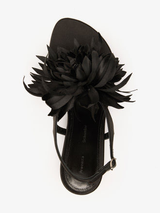 Proenza Schouler Still Life Aerial Image of Tee Thong Flower Sandals in Satin in Black