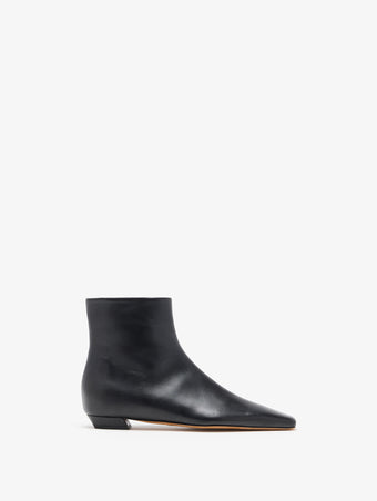 Front image of Trap Flat Ankle Boots In Nappa Leather in Black