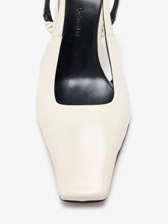Proenza Schouler detail image of Trap Cross Slingback Pumps in Spazzolato Leather in ecru