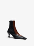 Proenza Schouler Still Life Image of Side View of Trap Stretch Ankle Boot 60MM Lizard Combo in Black/Cuoio Combo