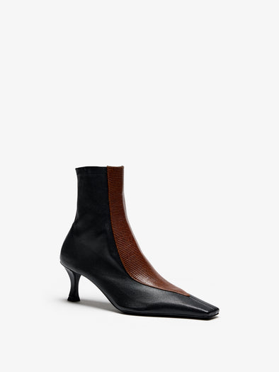 Proenza Schouler Still Life Image of Side View of Trap Stretch Ankle Boot 60MM Lizard Combo in Black/Cuoio Combo