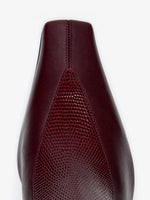 Proenza Schouler Still Life Image of Aerial View of Trap Stretch Ankle Boot 60MM Lizard Combo in Oxblood