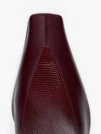 Proenza Schouler Still Life Image of Aerial View of Trap Stretch Ankle Boot 60MM Lizard Combo in Oxblood