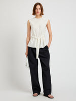 Proenza Schouler Front full length image of model wearing the Trina Top in Woven Stripe Flou in Chalk Black