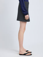 Proenza Schouler Side cropped image of model wearing Lawson Skirt in Tweed in Black