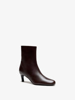 Proenza Schouler Side Still life image of Uma Ankle Boots in Tripon in Umber