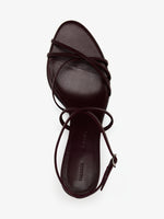 Proenza Schouler Still Life Aerial Image of Uma Ankle Strap Sandals in Currant