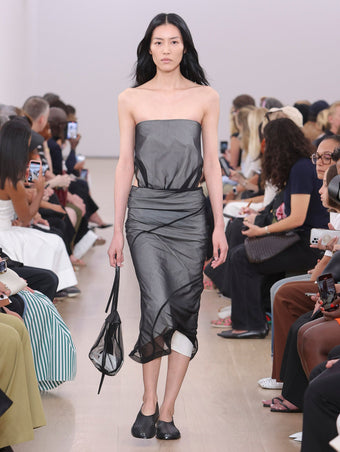 Runway image of the Gwen Strapless Dress In Silk Nylon in black and cream