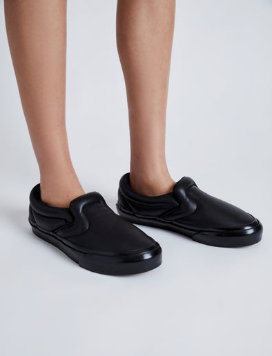 Image of model wearing Vans x Proenza Schouler Puffy Slip-On Shoes in black