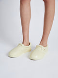 Image of model wearing Vans x Proenza Schouler Puffy Slip-On Shoes in resin