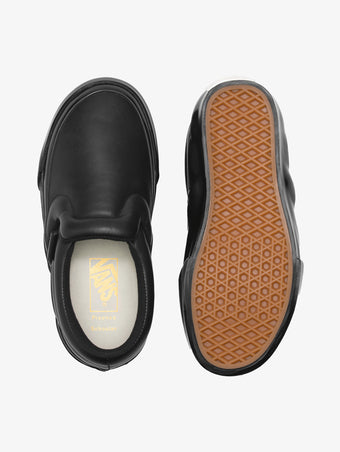 Aerial image of Vans x Proenza Schouler Puffy Slip-On Shoes in black