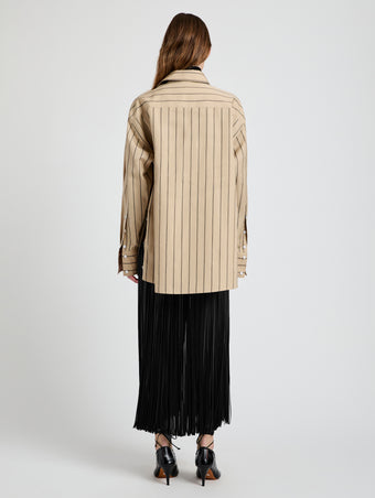 Proenza Schouler Back full length image of model wearing Veda Skirt in Faux Leather Fringe in Black