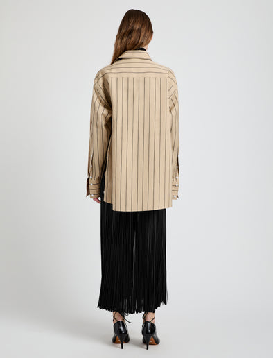 Proenza Schouler Back full length image of model wearing Veda Skirt in Faux Leather Fringe in Black