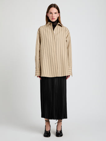 Proenza Schouler Front full length image of model wearing Veda Skirt in Faux Leather Fringe in Black