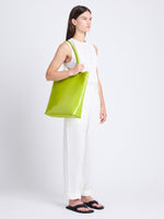 Image of model wearing Walker Tote in CHARTREUSE