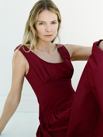 Proenza Schouler image of model sitting wearing Kendall Dress in Tech Cotton in Claret