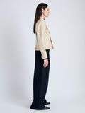 Side image of model wearing Ava Jacket in Brushed Cotton in canvas