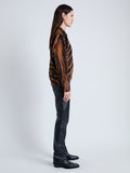 Side image of model wearing Blake Sweatshirt in BLACK/RUST