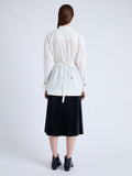 Back image of model wearing Senna Top in Poplin in off white