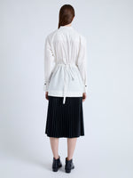 Back image of model wearing Senna Top in Poplin in off white