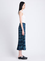 Side image of model in Piper Skirt In Ltd Pleatable Crepe in sage multi