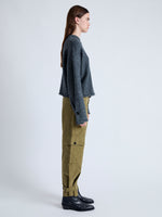 Side image of model wearing Kay Cargo Pant in FATIGUE