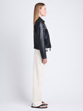 Side full length image of model wearing Annabel Jacket In Lightweight Leather in BLACK