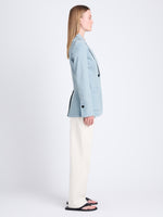 Side full length image of model wearing Freya Blazer In Stretch Twill in GREY INDIGO