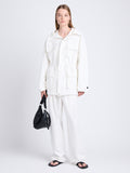 Front full length image of model wearing Nina Coat In Solid Cotton Crinkle in OFF WHITE zipped up
