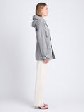Side full length image of model wearing Nina Coat In Grid Cotton Crinkle in BLACK/IVORY