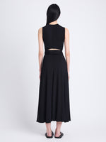 Back full length image of model wearing Beatrice Dress In Solid Jersey in BLACK