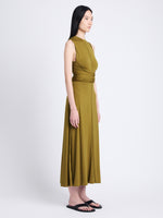 Side image of model wearing Beatrice Dress In Solid Jersey in OLIVE