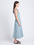 Side full length image of model wearing Arlet Sleeveless Dress In Stretch Twill in GREY INDIGO
