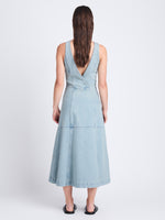 Back full length image of model wearing Arlet Sleeveless Dress In Stretch Twill in GREY INDIGO