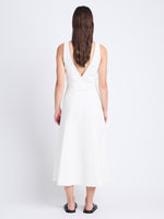 Back full length image of model wearing Arlet Sleeveless Dress In Stretch Twill in ECRU