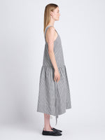 Side full length image of model wearing Sasha Dress In Grid Cotton Crinkle in BLACK/IVORY