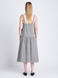 Back full length image of model wearing Sasha Dress In Grid Cotton Crinkle in BLACK/IVORY