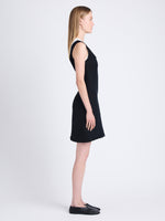 Side full length image of model wearing Luna Dress In Tweed in BLACK