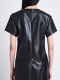 Detail image of model wearing Sonny Dress In Faux Leather in BLACK