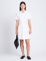 Front full length image of model wearing Carmine Dress In Solid Cotton Crinkle in OFF WHITE
