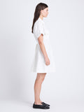 Side full length image of model wearing Carmine Dress In Solid Cotton Crinkle in OFF WHITE