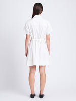 Back full length image of model wearing Carmine Dress In Solid Cotton Crinkle in OFF WHITE