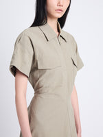 Detail image of model wearing Carmine Dress In Solid Cotton Crinkle in BAYLEAF